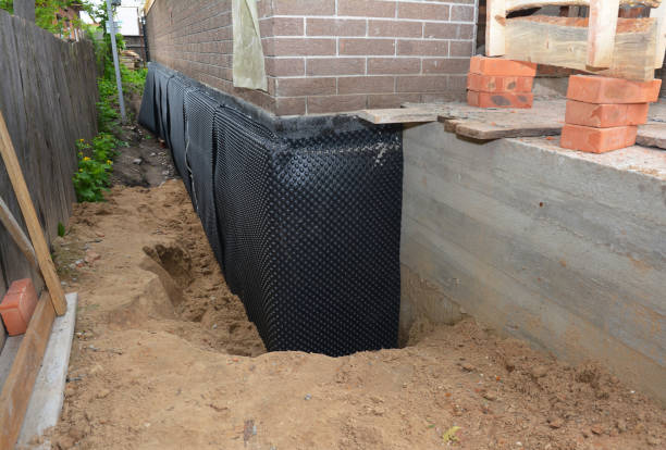 Happy homeowners after waterproofing job in Franklin